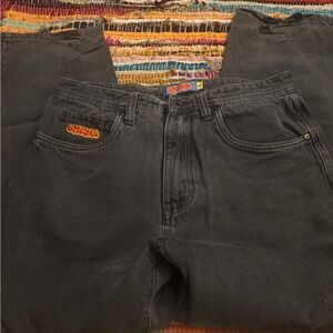 Empyre Men's Relaxed Black Jeans with Red Logo Patch